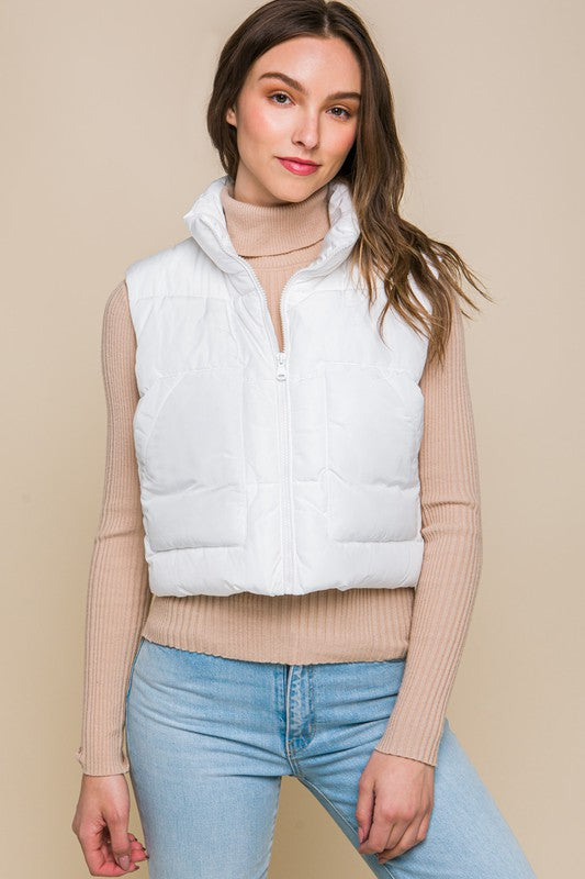 White puffer vests